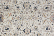 4' X 6' Tan Ivory And Blue Floral Stain Resistant Area Rug