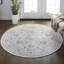 4' X 6' Tan Ivory And Blue Floral Stain Resistant Area Rug