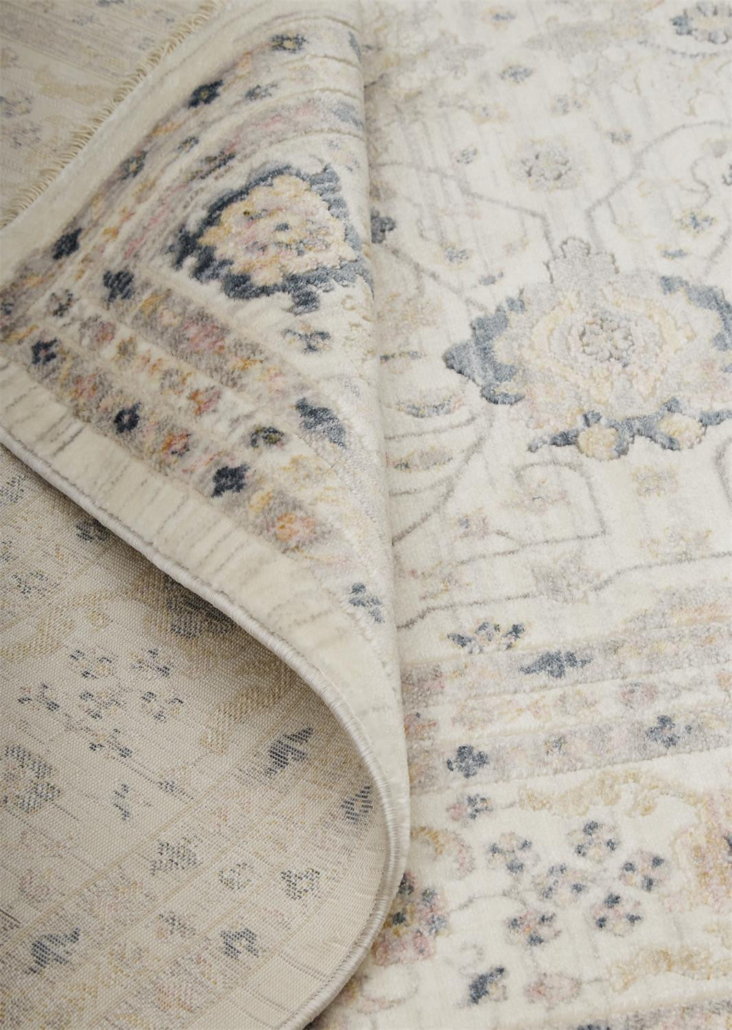 4' X 6' Tan Ivory And Blue Floral Stain Resistant Area Rug