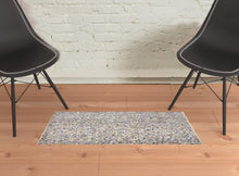 4' X 6' Taupe Tan And Orange Abstract Stain Resistant Area Rug