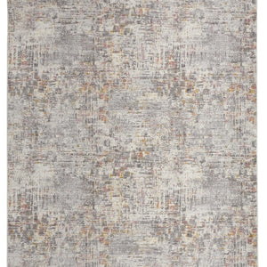 4' X 6' Ivory Tan And Taupe Abstract Stain Resistant Area Rug