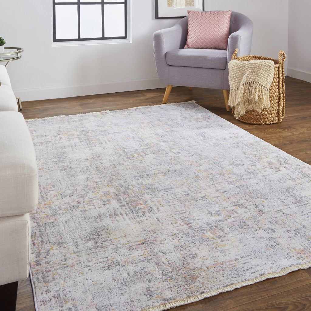 4' X 6' Ivory Tan And Taupe Abstract Stain Resistant Area Rug
