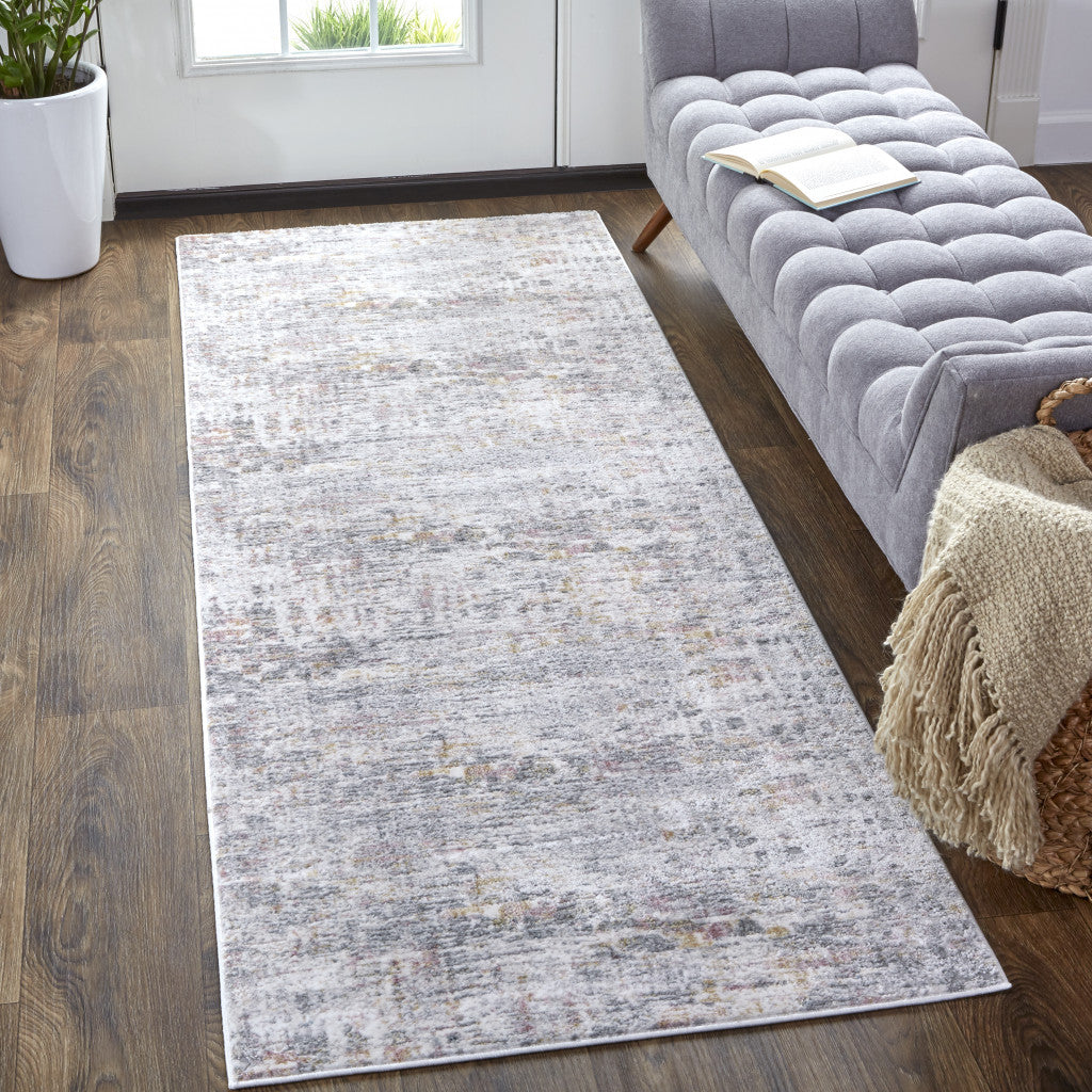 4' X 6' Ivory Tan And Taupe Abstract Stain Resistant Area Rug