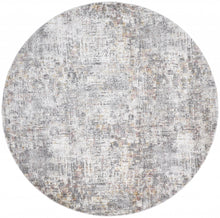4' X 6' Ivory Tan And Taupe Abstract Stain Resistant Area Rug