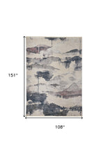 5' X 7' Ivory Blue And Pink Abstract Stain Resistant Area Rug