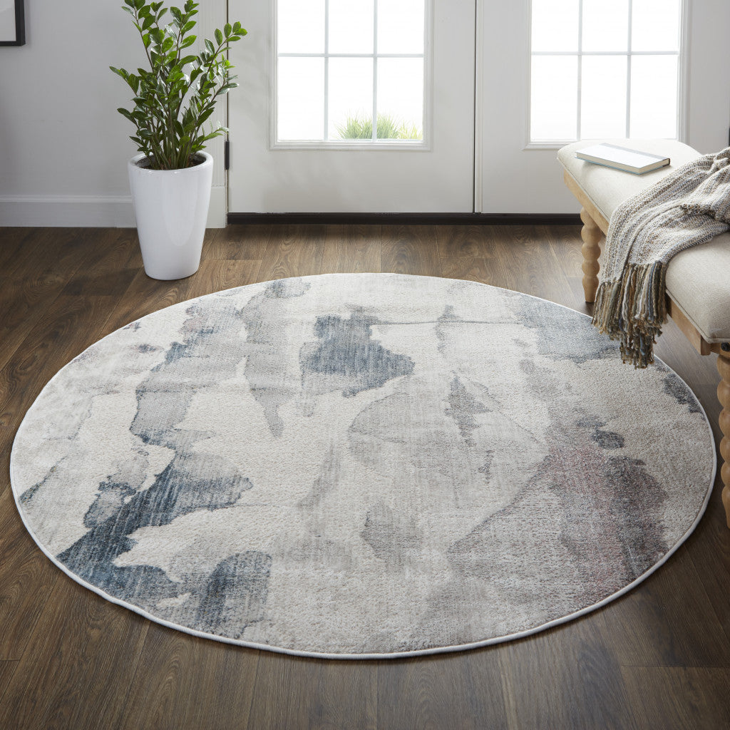 5' X 7' Ivory Blue And Pink Abstract Stain Resistant Area Rug