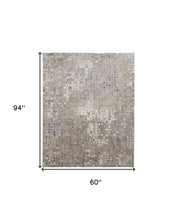 4' X 6' Tan Ivory And Blue Geometric Power Loom Distressed Area Rug