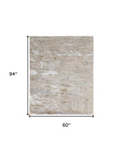 Tan Orange And Ivory Abstract Power Loom Distressed Area Rug - 4' x 6'