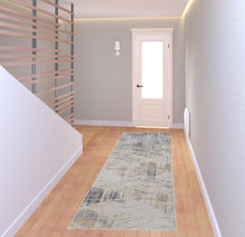 4' X 6' Tan Ivory And Gray Abstract Power Loom Distressed Area Rug