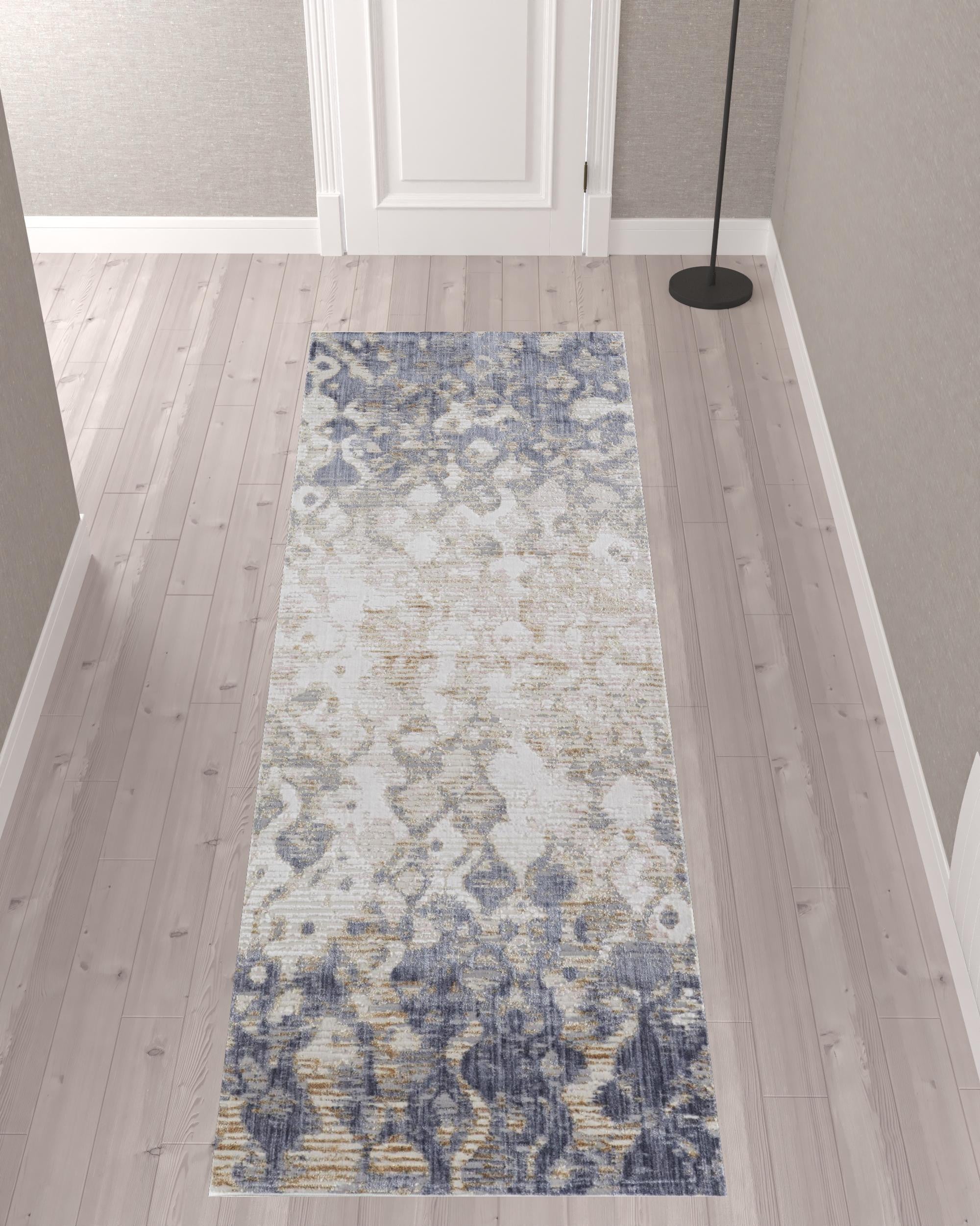4' X 6' Tan Ivory And Blue Abstract Power Loom Distressed Area Rug