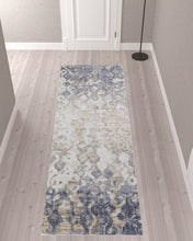 4' X 6' Tan Ivory And Blue Abstract Power Loom Distressed Area Rug
