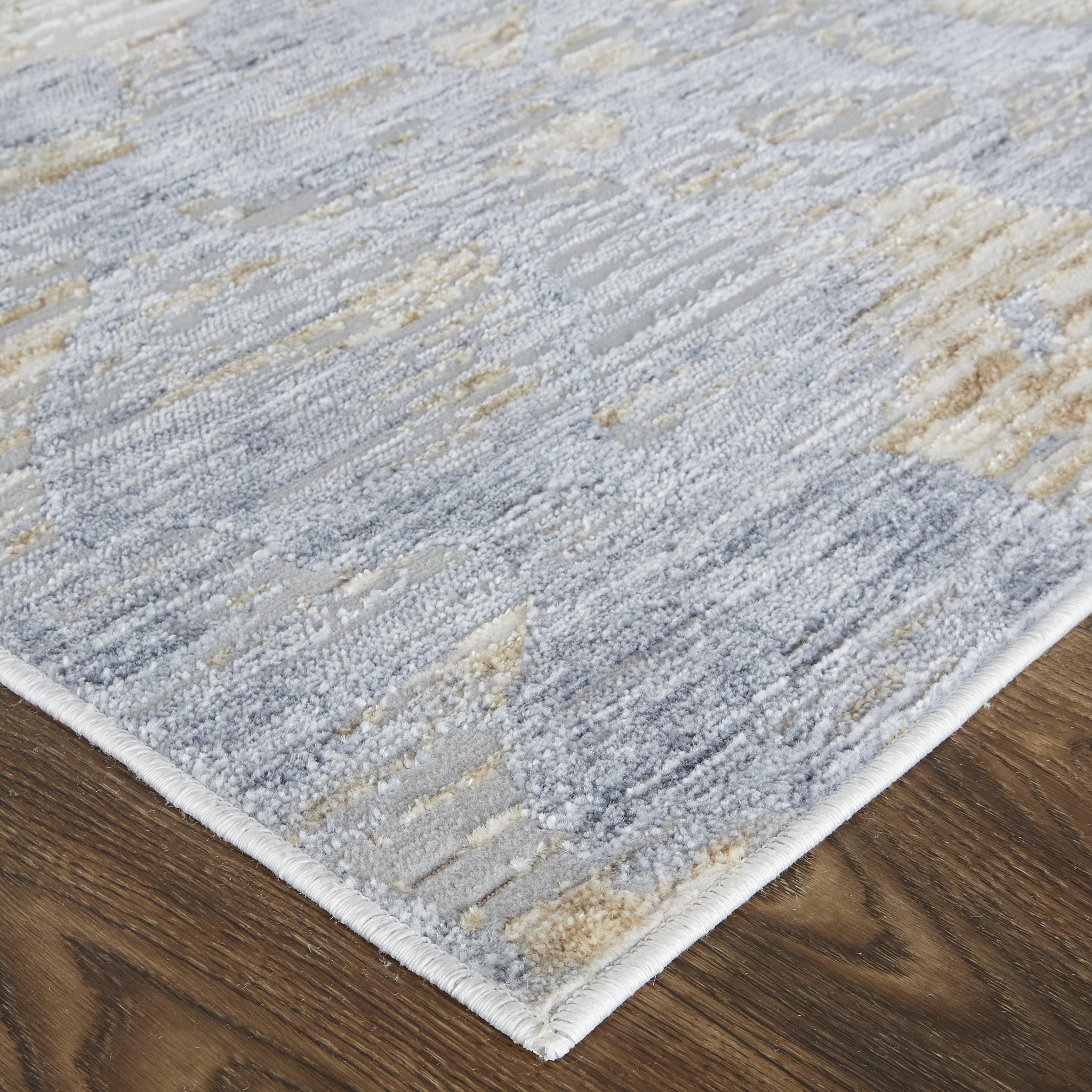 4' X 6' Tan Ivory And Blue Abstract Power Loom Distressed Area Rug