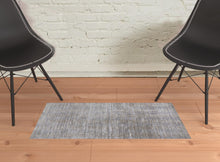 4' X 6' Taupe Silver And Tan Abstract Power Loom Area Rug