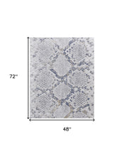 4' X 6' Silver Gray And Blue Animal Print Power Loom Distressed Area Rug