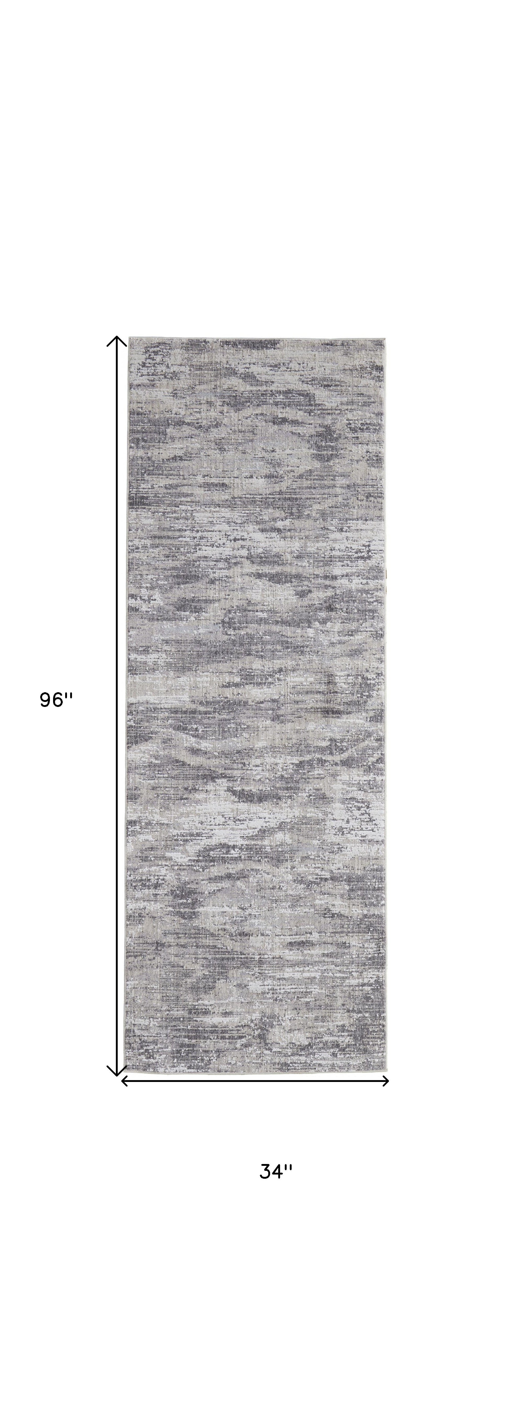 4' X 6' Tan Taupe And Gray Abstract Power Loom Distressed Stain Resistant Area Rug