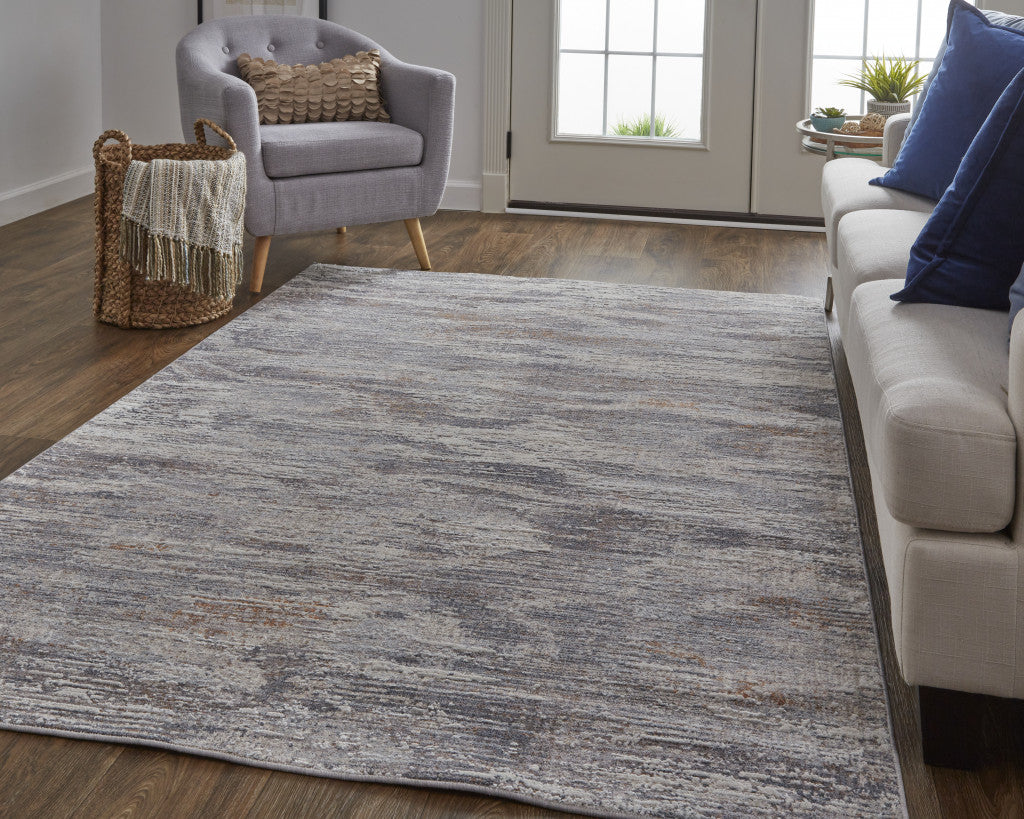4' X 6' Tan Taupe And Gray Abstract Power Loom Distressed Stain Resistant Area Rug