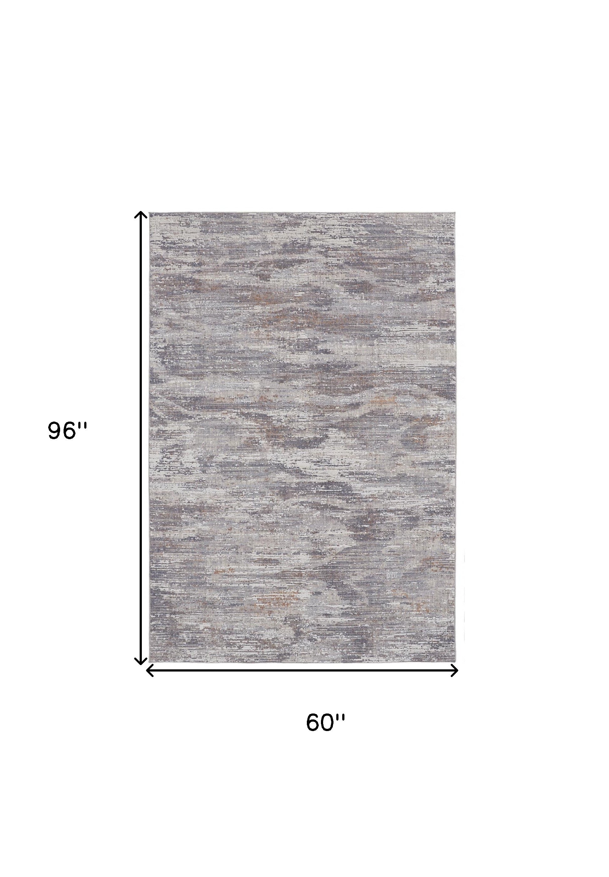 4' X 6' Tan Taupe And Gray Abstract Power Loom Distressed Stain Resistant Area Rug