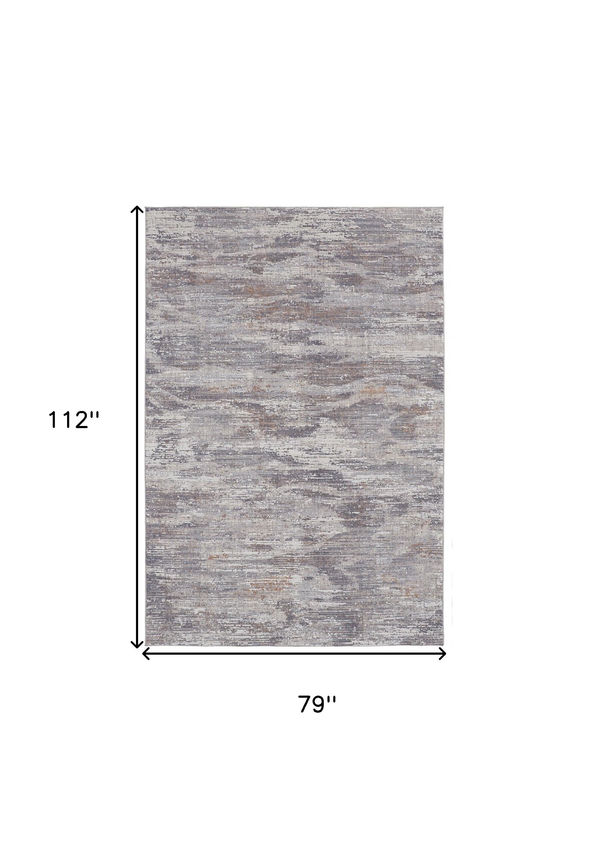 4' X 6' Tan Taupe And Gray Abstract Power Loom Distressed Stain Resistant Area Rug