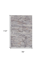 4' X 6' Tan Taupe And Gray Abstract Power Loom Distressed Stain Resistant Area Rug
