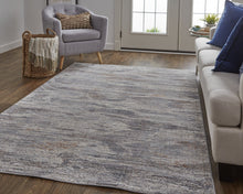 4' X 6' Tan Taupe And Gray Abstract Power Loom Distressed Stain Resistant Area Rug