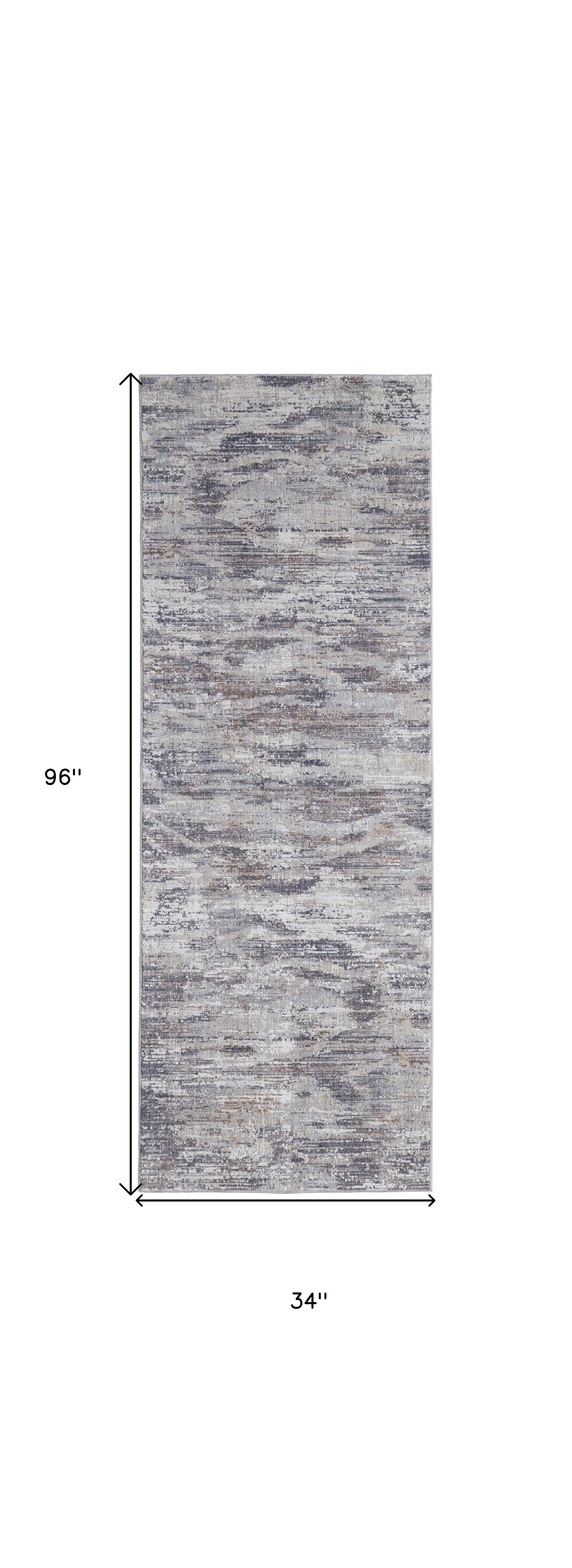 4' X 6' Tan Taupe And Gray Abstract Power Loom Distressed Stain Resistant Area Rug