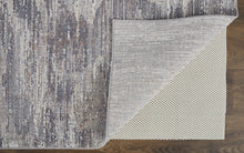 4' X 6' Tan Taupe And Gray Abstract Power Loom Distressed Stain Resistant Area Rug
