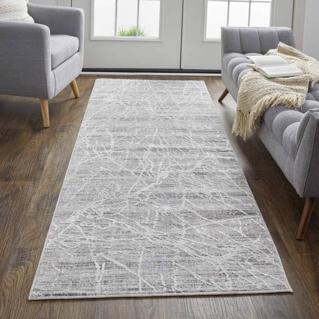 4' X 6' Taupe And Gray Abstract Power Loom Distressed Stain Resistant Area Rug