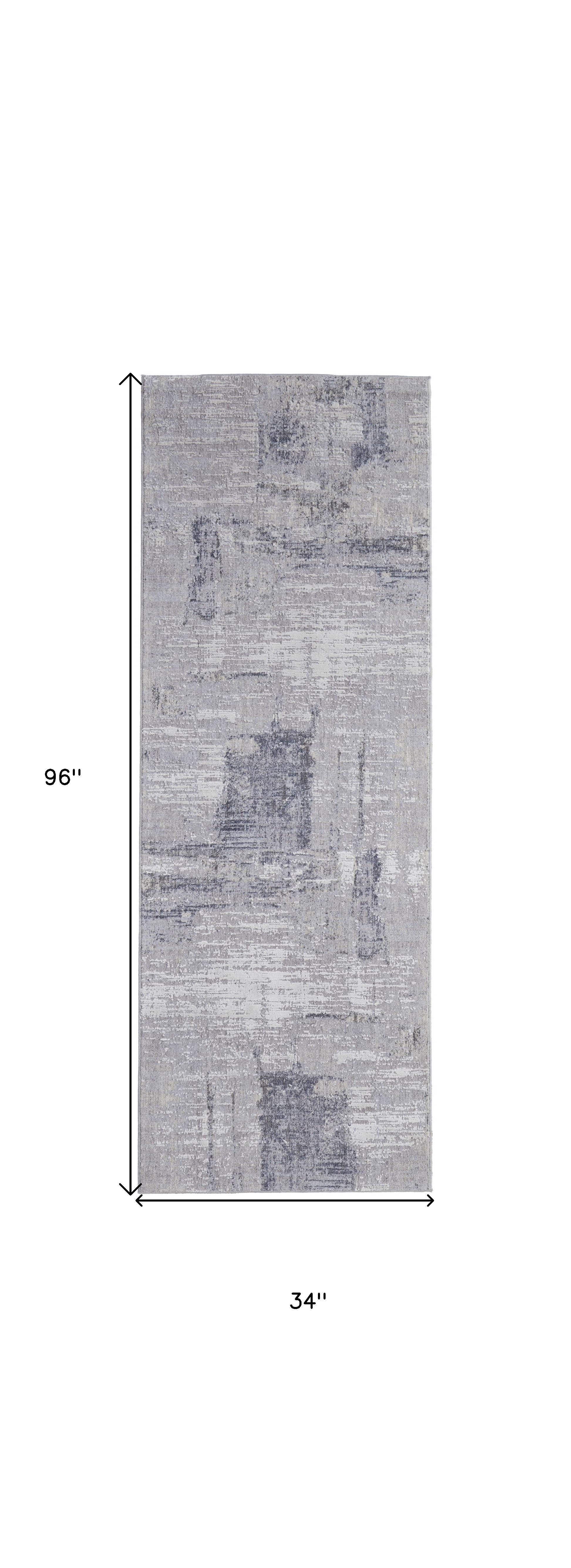 4' X 6' Taupe Tan And Blue Abstract Power Loom Distressed Stain Resistant Area Rug