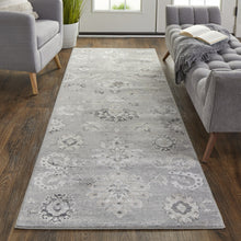 4' X 6' Silver And Black Floral Power Loom Distressed Area Rug