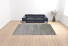 4' X 6' Gray Silver And Taupe Floral Power Loom Distressed Area Rug