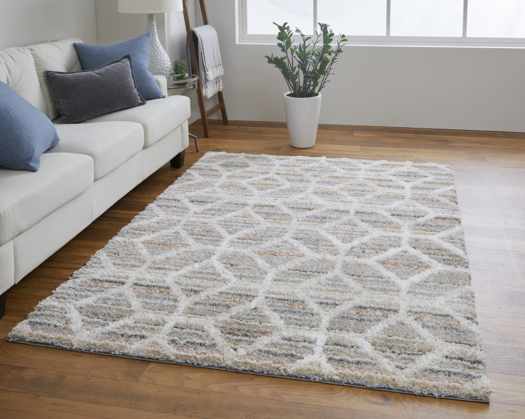 4' X 6' Tan Taupe And Ivory Geometric Power Loom Stain Resistant Area Rug