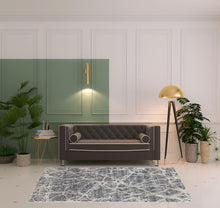 4' X 6' Gray And Ivory Abstract Power Loom Stain Resistant Area Rug