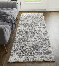 4' X 6' Gray And Ivory Abstract Power Loom Stain Resistant Area Rug