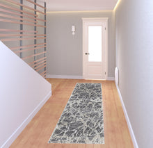 4' X 6' Gray And Ivory Abstract Power Loom Stain Resistant Area Rug