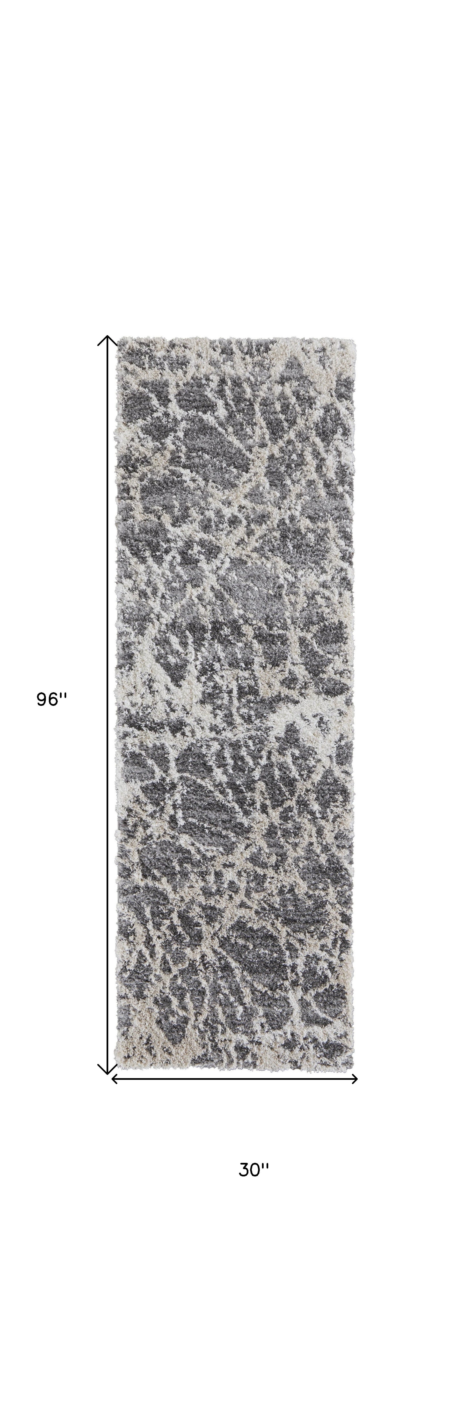 4' X 6' Gray And Ivory Abstract Power Loom Stain Resistant Area Rug