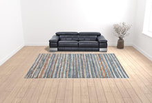 4' X 6' Ivory Blue And Orange Striped Power Loom Stain Resistant Area Rug