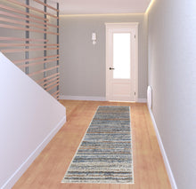 4' X 6' Ivory Blue And Orange Striped Power Loom Stain Resistant Area Rug