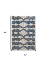 4' X 6' Ivory Gray And Blue Chevron Power Loom Stain Resistant Area Rug