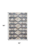 4' X 6' Ivory Gray And Blue Chevron Power Loom Stain Resistant Area Rug