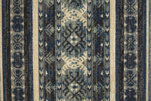 4' X 6' Blue Tan And Black Geometric Power Loom Distressed Stain Resistant Area Rug