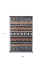 Blue Tan And Black Geometric Power Loom Distressed Stain Resistant Area Rug - 4' x 6'