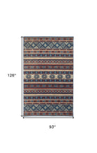 Blue Tan And Black Geometric Power Loom Distressed Stain Resistant Area Rug - 4' x 6'
