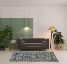 4' X 6' Ivory Tan And Blue Abstract Power Loom Distressed Stain Resistant Area Rug