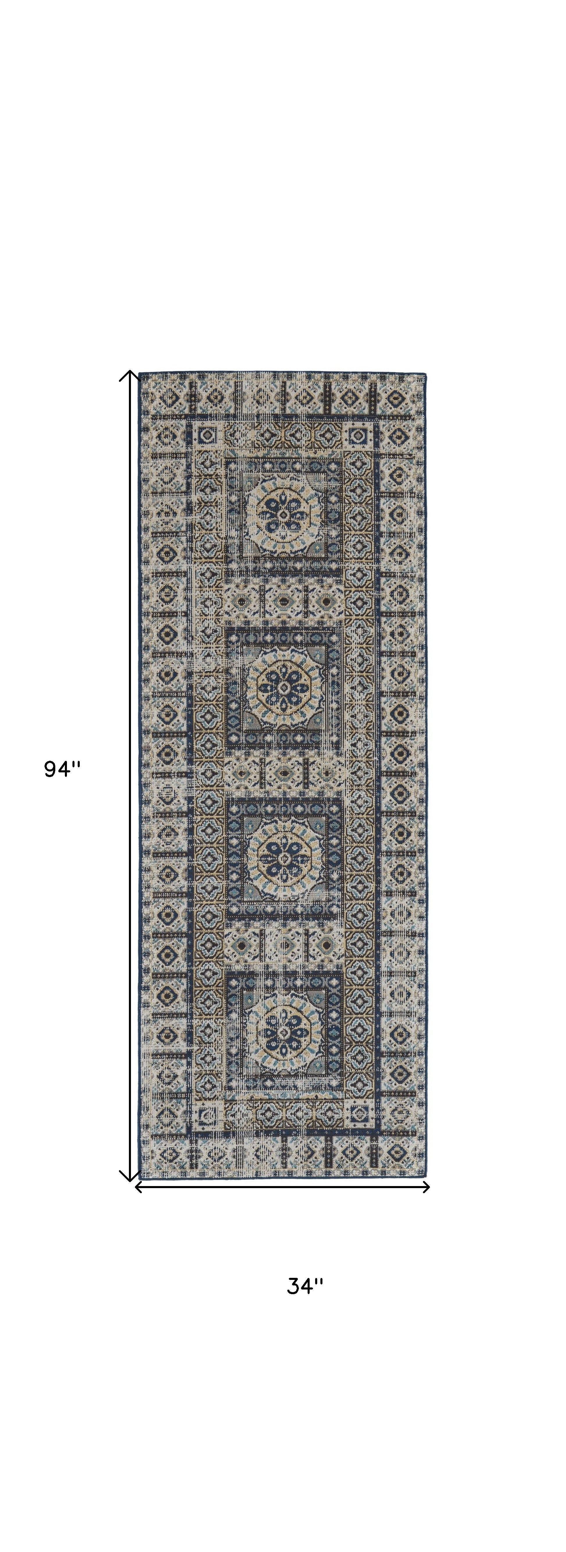 4' X 6' Ivory Tan And Blue Abstract Power Loom Distressed Stain Resistant Area Rug