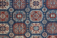 4' X 6' Blue Red And Tan Abstract Power Loom Distressed Stain Resistant Area Rug