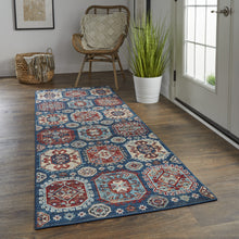 4' X 6' Blue Red And Tan Abstract Power Loom Distressed Stain Resistant Area Rug