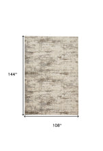 4' X 6' Ivory And Brown Abstract Area Rug