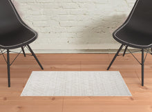 4' X 6' Ivory And Gray Striped Hand Woven Area Rug