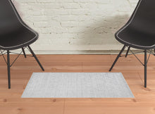 5' X 8' White And Silver Striped Hand Woven Area Rug