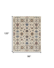 4' X 6' Ivory Blue And Tan Wool Floral Tufted Handmade Stain Resistant Area Rug